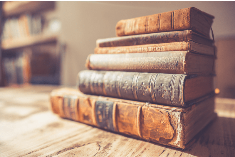 stack of antique books