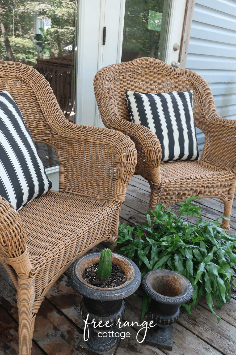 Wicker patio chairs with black and white pillows