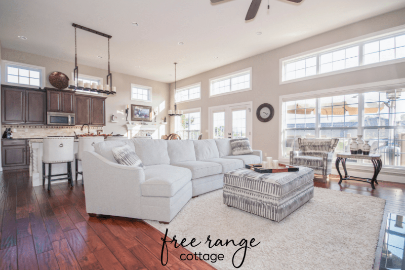 Open concept white living room and kitchen