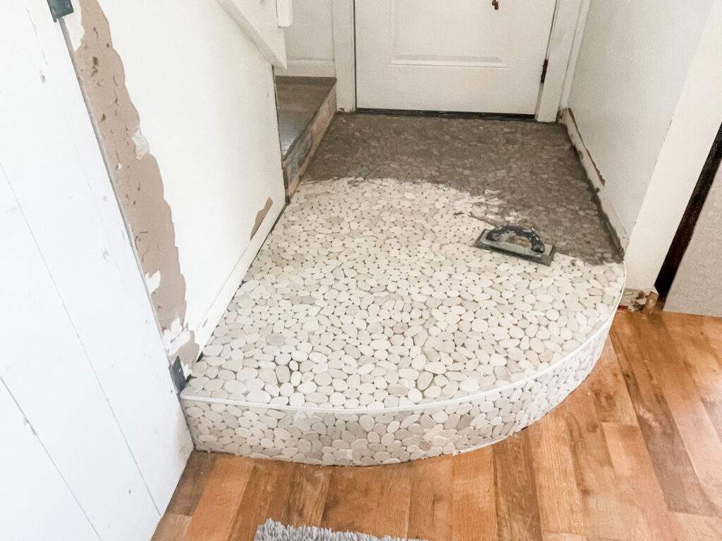 pebble floor tile installation