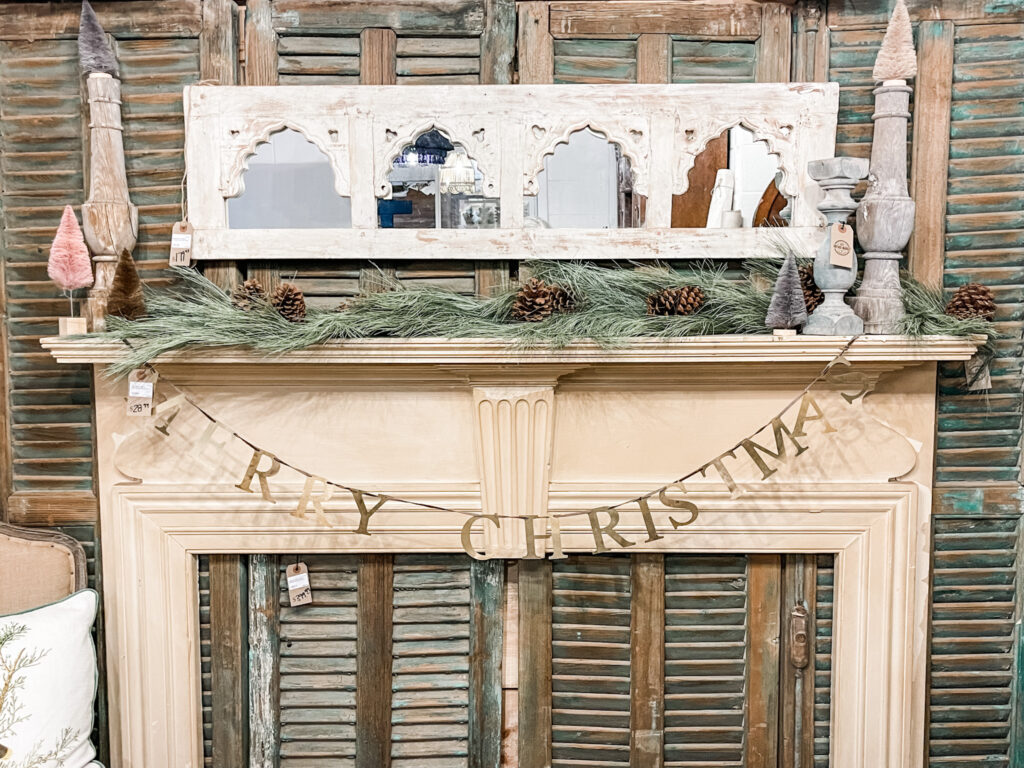Fireplace mantel with Merry Christmas banner