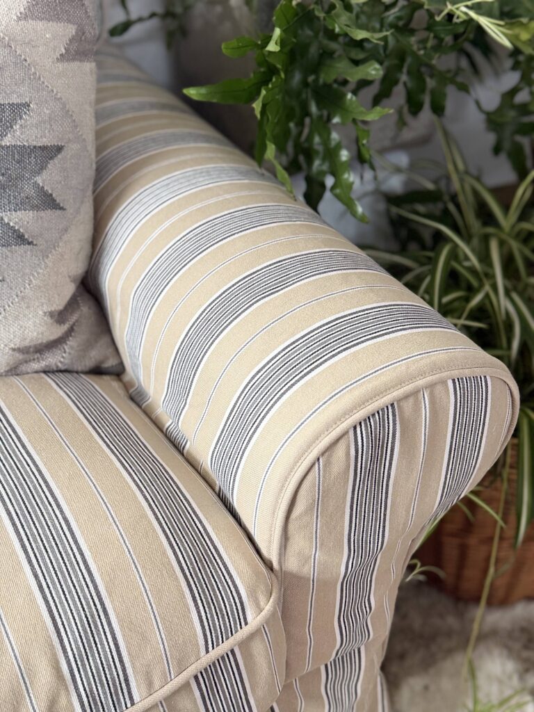 Rolled arm of IKEA Uppland sofa