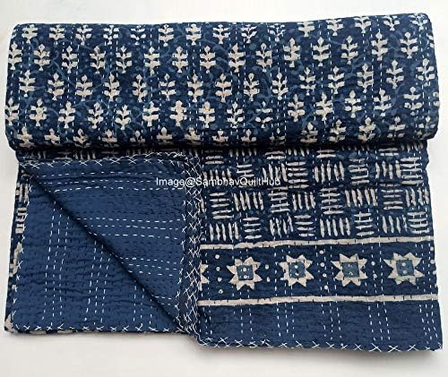 Blue and cream hand printed Indigo quilt showing front detail and back stiching detail